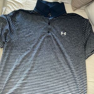 Men’s under armour golf shirt. New condition
